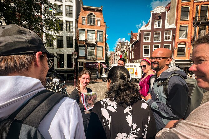 Small Group Walking Tour - Hello Amsterdam - Singel and the Dancing Houses: canal beauty with a purpose