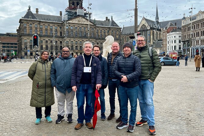 Small Group Walking Tour in Amsterdam with Friendly and Fun Guide - Begijnhof: the calm courtyard with laywomen housing, plus two religious spaces