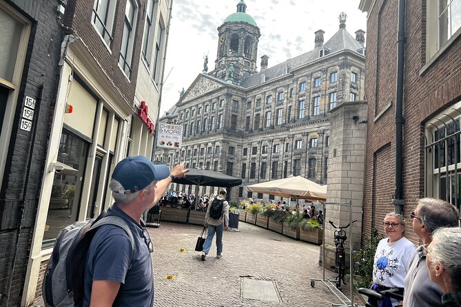 Small Group Walking Tour in Amsterdam with Friendly and Fun Guide - Starting at Dam Square: the 15-minute orientation you’ll use all trip