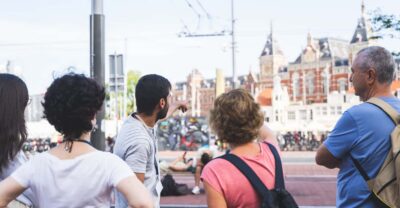 Small-Group Walking Tour with Amsterdam Canal Cruise - Starting at Beursplein: the route’s purpose and best timing