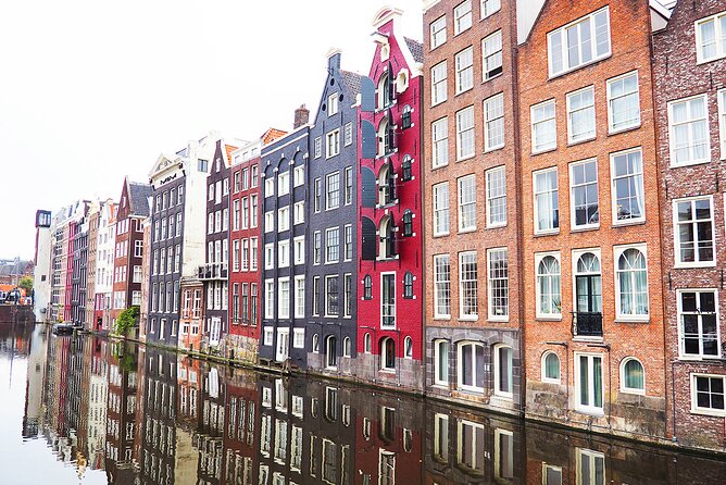 Small-Group Women's History Tour in Amsterdam - Stop 3: Dam Square and the art of a tasteful scandal