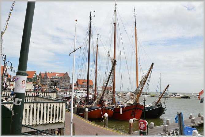 Zaanse Schans Windmills, cheese and clogs and Volendam tour from Amsterdam - Volendam: harbor stroll, dijk views, and what to eat on the waterfront